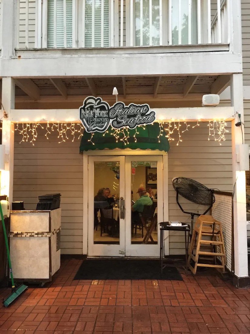 New York Pasta Garden entrance on Duval Street with string lights