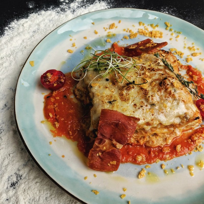 Layered lasagna with meat sauce and melted cheese